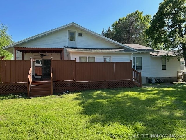 804 W Taliaferro, Madill, OK 73446 - back of house with ceiling fan, a deck, a yard, and entry steps