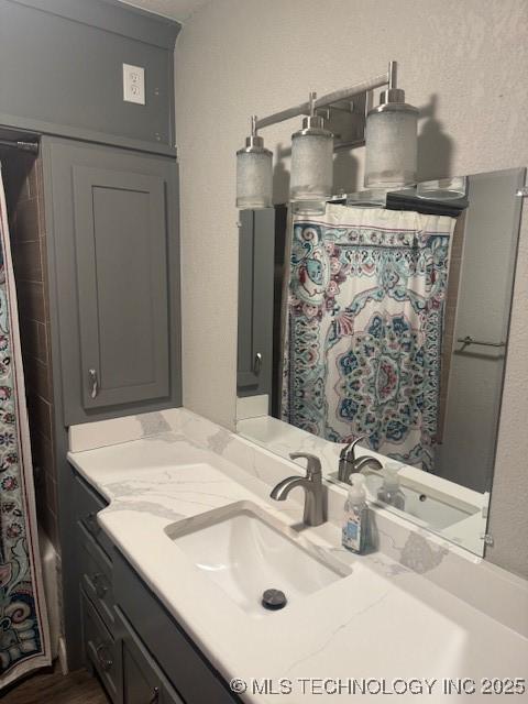 804 W Taliaferro, Madill, OK 73446 - full bathroom featuring vanity and a shower with shower curtain