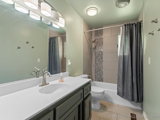 2318 Dorchester Dr, Bartlesville, OK 74006 - full bathroom featuring toilet, vanity, shower / tub combo with curtain, and tile patterned flooring