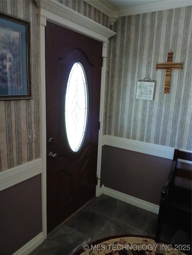 715 Kiowa, Hartshorne, OK 74547 - foyer featuring baseboards and ornamental molding
