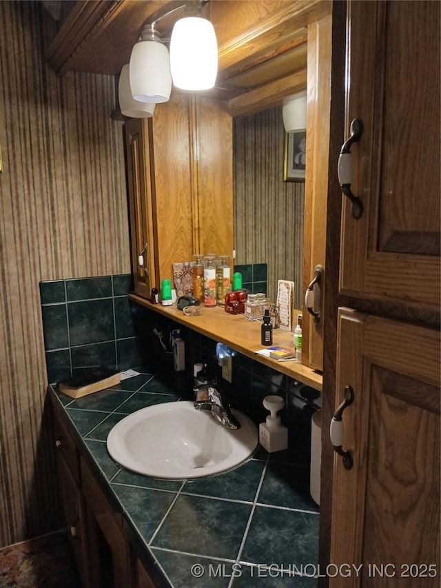 715 Kiowa, Hartshorne, OK 74547 - bathroom featuring wallpapered walls and vanity