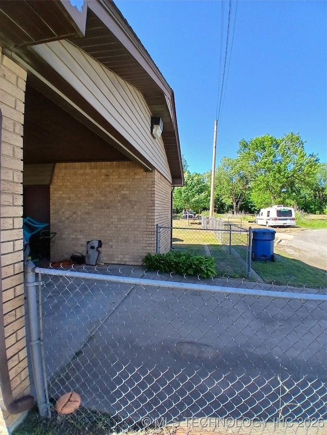 715 Kiowa, Hartshorne, OK 74547 - view of home's exterior with brick siding