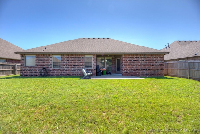 10216 N 120th E Ave, Owasso, OK 74055 - back of house featuring brick siding and a patio
