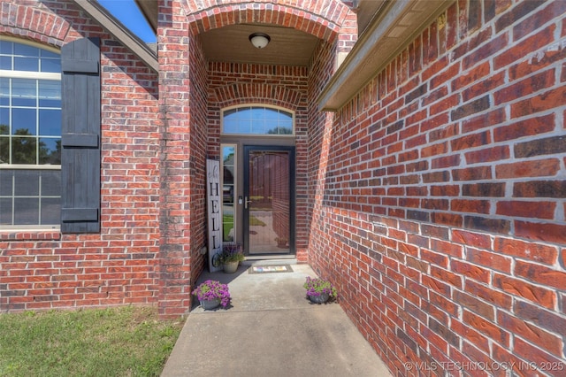 10216 N 120th E Ave, Owasso, OK 74055 - property entrance with brick siding