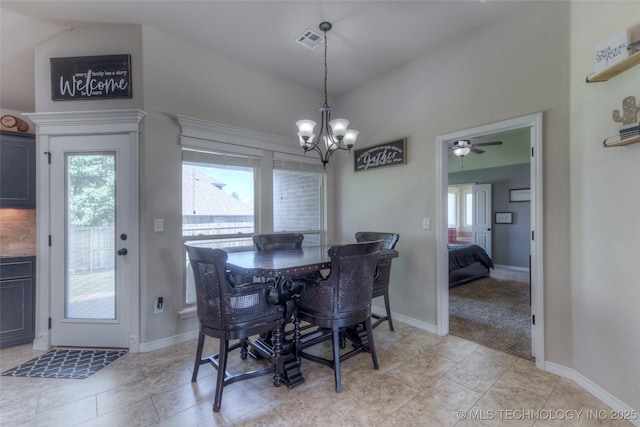 10216 N 120th E Ave, Owasso, OK 74055 - dining room featuring a chandelier, plenty of natural light, lofted ceiling, baseboards, and ceiling fan