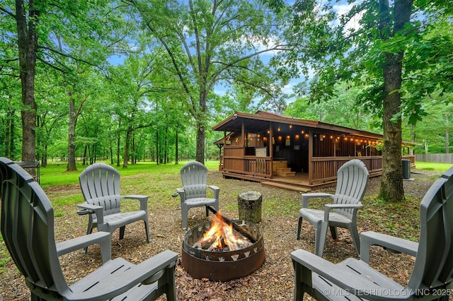 47 Tahnee Ln, Broken Bow, OK 74728 - view of yard with a fire pit
