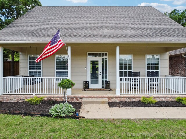 4602 S Linwood Dr, Sand Springs, OK 74063 - bungalow-style house featuring covered porch and roof with shingles