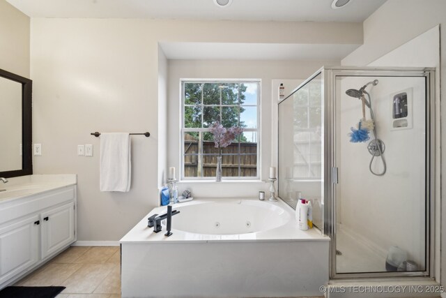 4602 S Linwood Dr, Sand Springs, OK 74063 - bathroom featuring a shower stall, a tub with jets, vanity, and tile patterned flooring