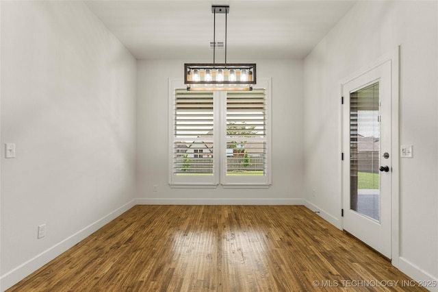 2978 E 146th St S, Bixby, OK 74008 - unfurnished dining area with wood finished floors and baseboards