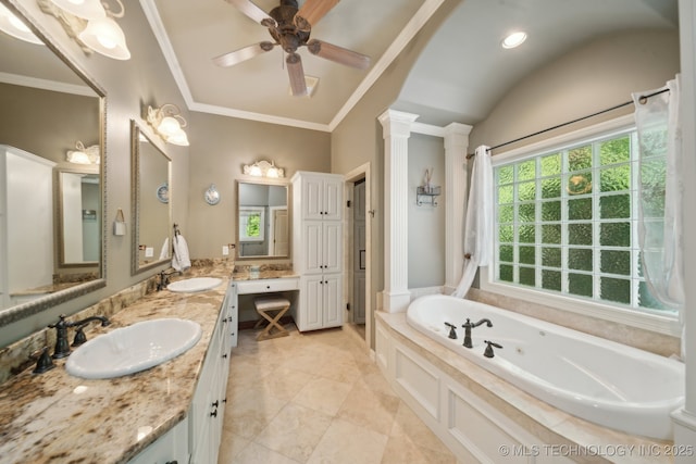 3335 E 93rd St, Tulsa, OK 74137 - bathroom with double vanity, a tub with jets, a ceiling fan, ornate columns, and crown molding