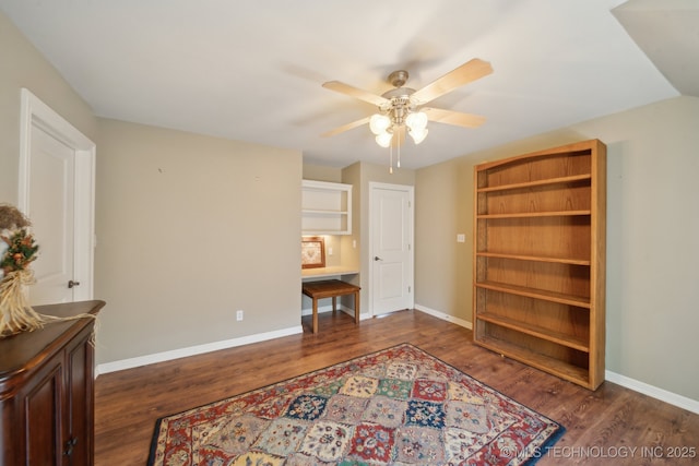 3335 E 93rd St, Tulsa, OK 74137 - bedroom with dark wood-style floors, baseboards, and a ceiling fan