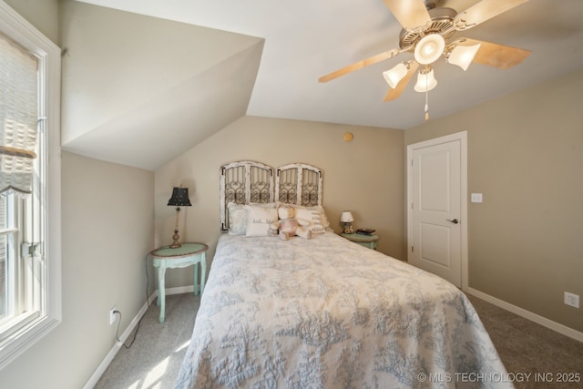 3335 E 93rd St, Tulsa, OK 74137 - bedroom with carpet floors, multiple windows, lofted ceiling, ceiling fan, and baseboards