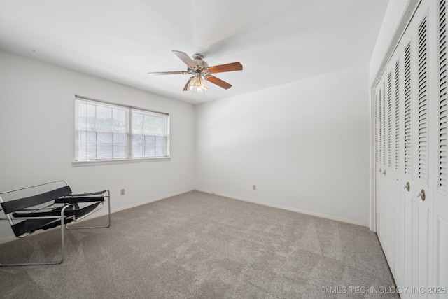 5538 E 46th St Unit 9, Tulsa, OK 74135 - unfurnished bedroom with carpet flooring, a closet, baseboards, and ceiling fan