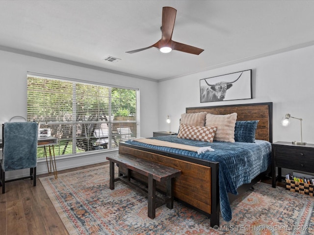 5553 S Delaware Ct, Tulsa, OK 74105 - bedroom featuring wood finished floors and a ceiling fan
