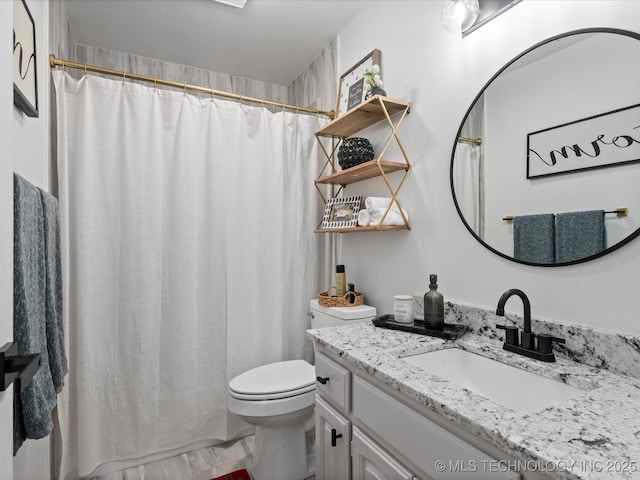 5553 S Delaware Ct, Tulsa, OK 74105 - full bath with vanity, toilet, and a shower with shower curtain