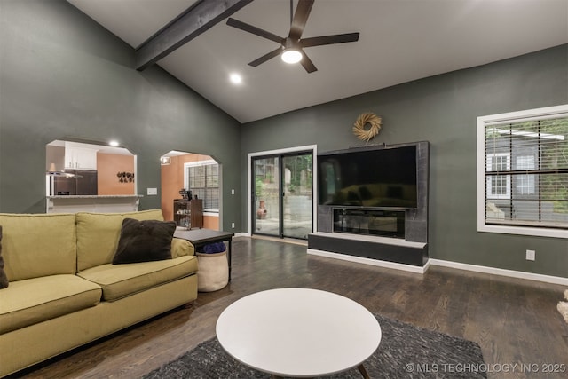 7423 S Urbana Ave, Tulsa, OK 74136 - living area featuring a ceiling fan, beamed ceiling, wood finished floors, high vaulted ceiling, and arched walkways