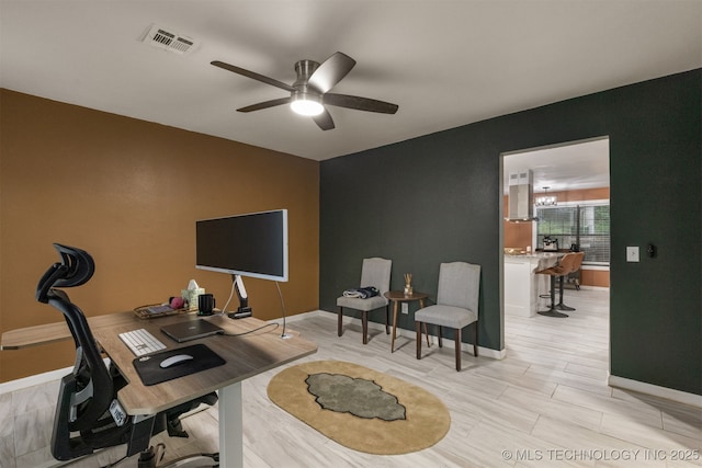 7423 S Urbana Ave, Tulsa, OK 74136 - home office featuring a ceiling fan and baseboards