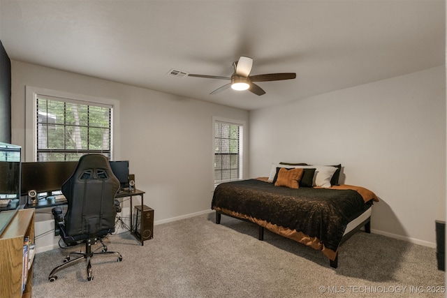 7423 S Urbana Ave, Tulsa, OK 74136 - bedroom with carpet floors, an office area, baseboards, and ceiling fan