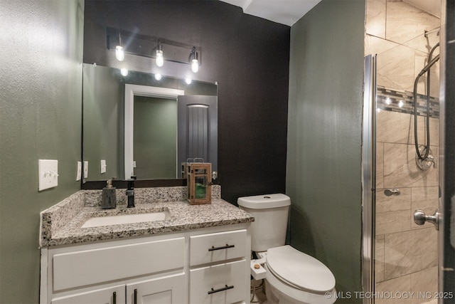 7423 S Urbana Ave, Tulsa, OK 74136 - full bathroom featuring vanity, toilet, and a stall shower