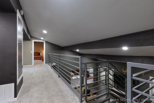 7423 S Urbana Ave, Tulsa, OK 74136 - hall with recessed lighting, carpet floors, baseboards, vaulted ceiling, and an upstairs landing