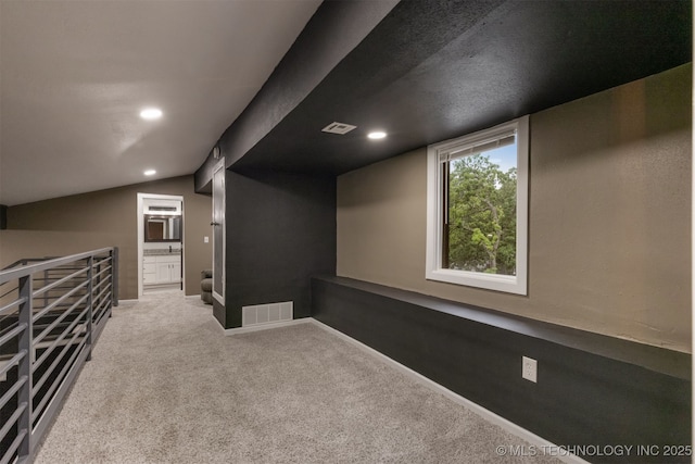 7423 S Urbana Ave, Tulsa, OK 74136 - bonus room with carpet floors, lofted ceiling, baseboards, and recessed lighting