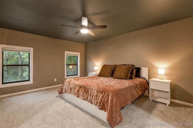 7423 S Urbana Ave, Tulsa, OK 74136 - carpeted bedroom featuring baseboards and a ceiling fan
