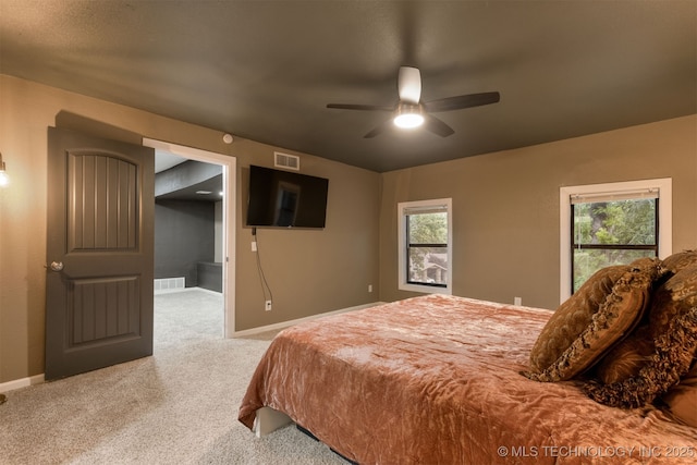 7423 S Urbana Ave, Tulsa, OK 74136 - carpeted bedroom featuring baseboards and ceiling fan