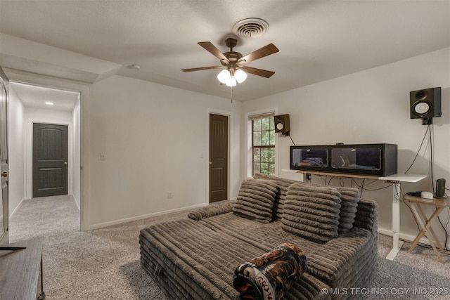 7423 S Urbana Ave, Tulsa, OK 74136 - carpeted living room with a ceiling fan and baseboards