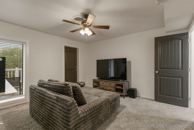 7423 S Urbana Ave, Tulsa, OK 74136 - living area featuring carpet, a ceiling fan, and baseboards