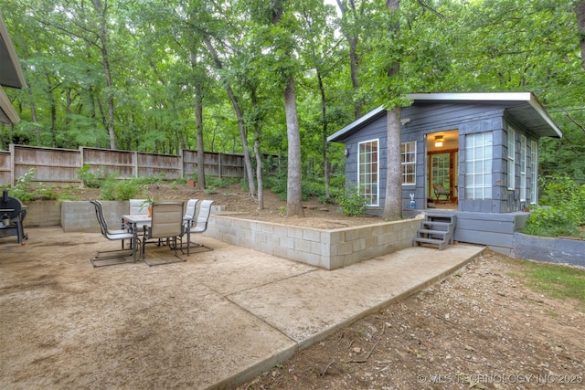 7423 S Urbana Ave, Tulsa, OK 74136 - view of patio featuring outdoor dining area and a grill