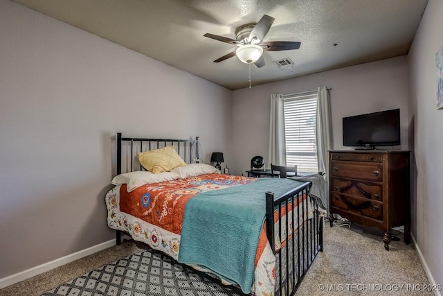 505 Teriwine, Perkins, OK 74059 - bedroom with baseboards, carpet floors, and ceiling fan