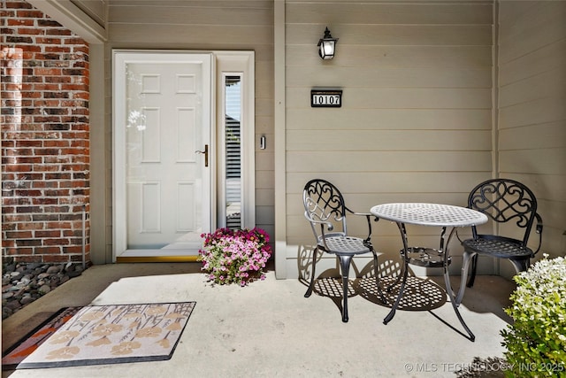 10107 S 94th E Pl, Tulsa, OK 74133 - view of exterior entry with brick siding
