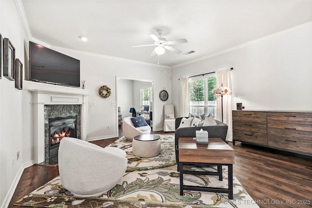 10107 S 94th E Pl, Tulsa, OK 74133 - living area with a ceiling fan, dark wood-style floors, a fireplace, crown molding, and baseboards