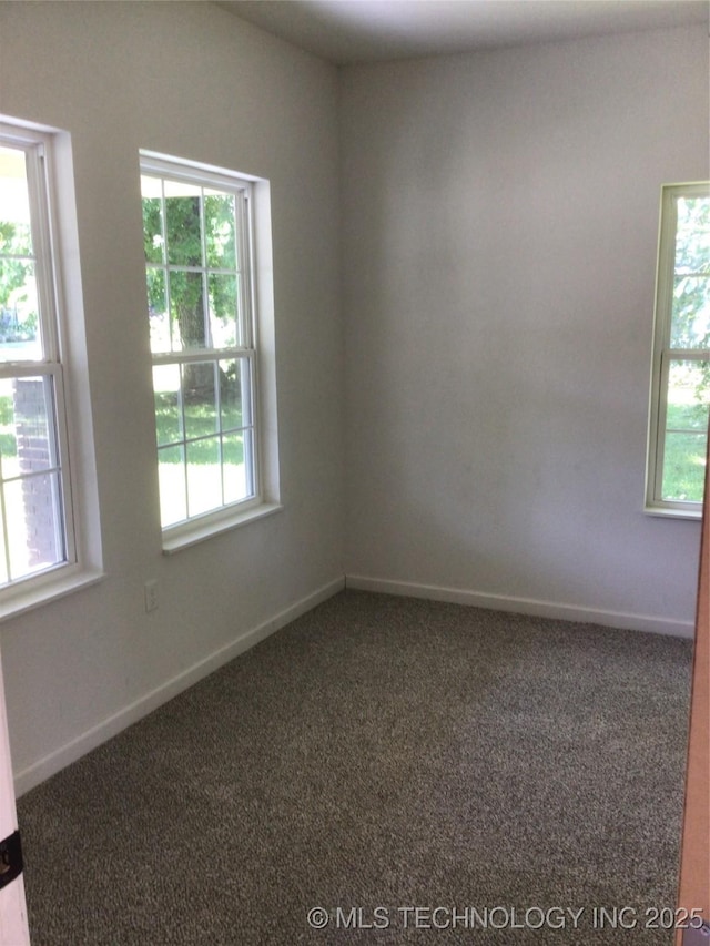 218 N Vann St, Pryor, OK 74361 - unfurnished room featuring carpet floors and baseboards