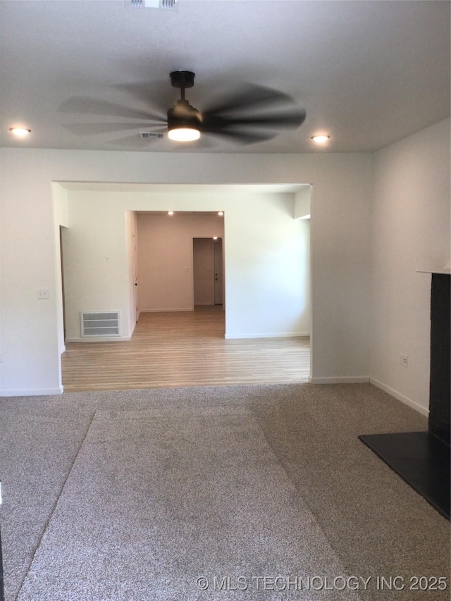 218 N Vann St, Pryor, OK 74361 - empty room featuring light colored carpet, ceiling fan, baseboards, and recessed lighting