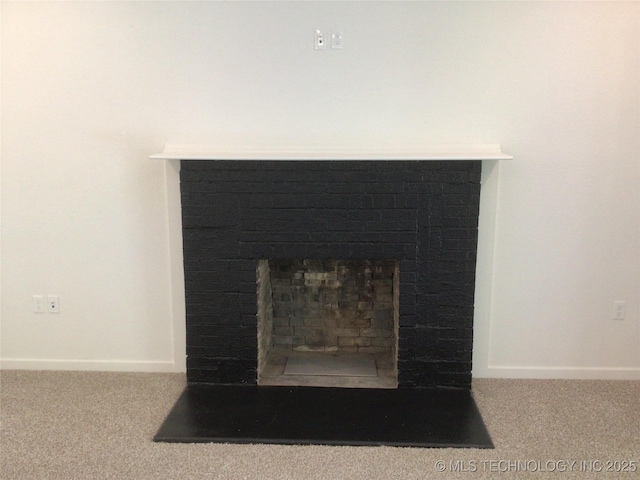 218 N Vann St, Pryor, OK 74361 - detailed view of carpet flooring, a fireplace, and baseboards