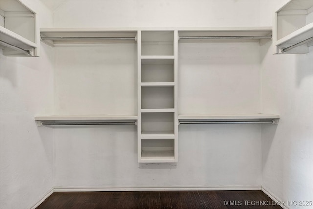 7416 W 40th St, Tulsa, OK 74107 - spacious closet featuring dark wood-style flooring