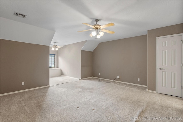 7416 W 40th St, Tulsa, OK 74107 - bonus room featuring carpet flooring, a ceiling fan, baseboards, and vaulted ceiling