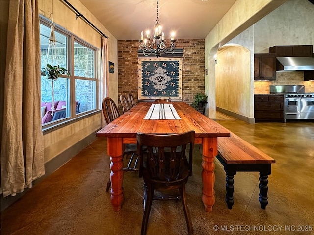16012 N 145th Ave, Collinsville, OK 74021 - dining space with a chandelier and concrete floors