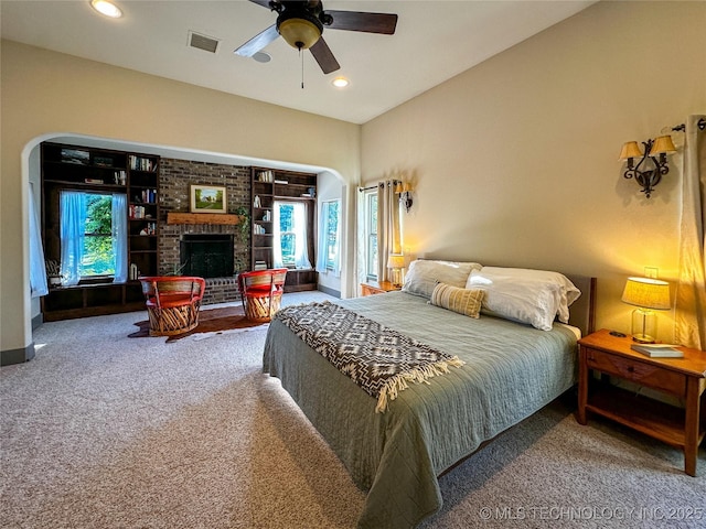16012 N 145th Ave, Collinsville, OK 74021 - bedroom featuring carpet, multiple windows, a fireplace, recessed lighting, and ceiling fan