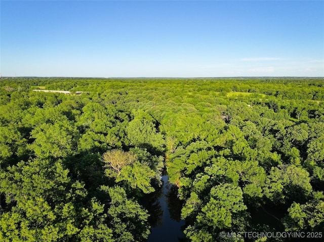 16012 N 145th Ave, Collinsville, OK 74021 - aerial view of a heavily wooded area