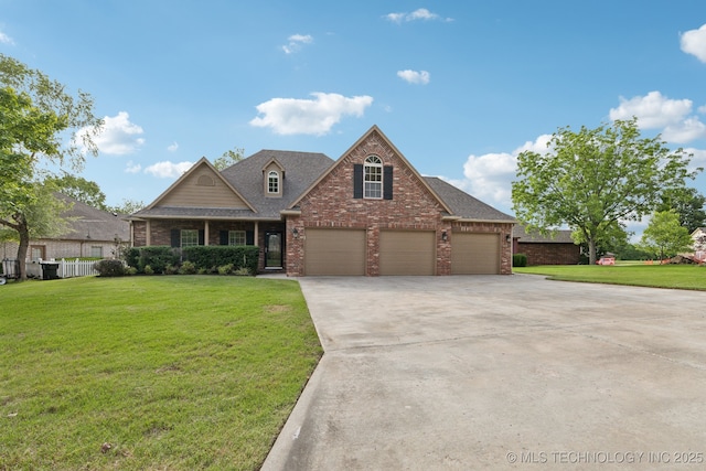 3200 Heritage Dr, Claremore, OK 74019 - view of front facade featuring brick siding, concrete driveway, an attached garage, and roof with shingles