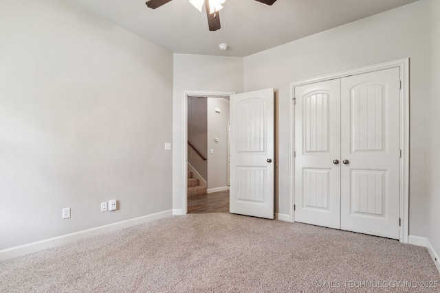 3200 Heritage Dr, Claremore, OK 74019 - unfurnished bedroom with carpet flooring, baseboards, a closet, and a ceiling fan
