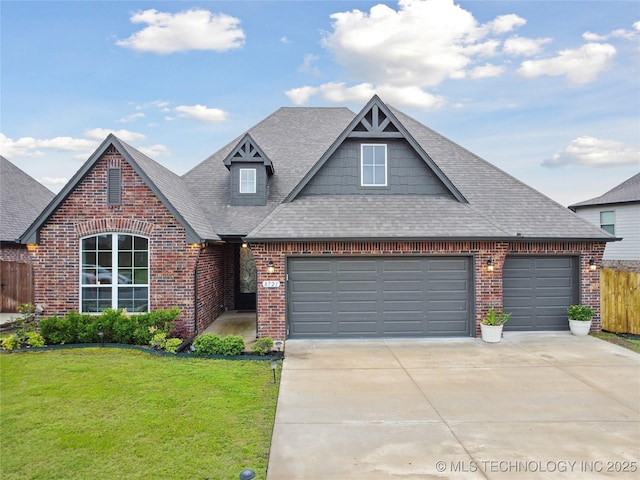 8721 E Joliet St, Broken Arrow, OK 74014 - view of front of home featuring a garage, brick siding, a shingled roof, and concrete driveway