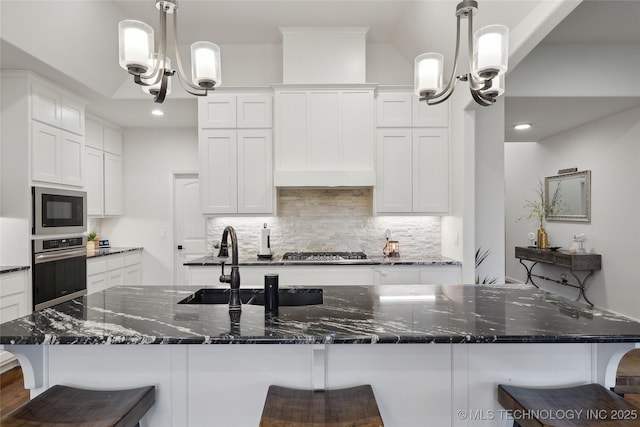 8721 E Joliet St, Broken Arrow, OK 74014 - kitchen with stainless steel appliances, decorative backsplash, white cabinetry, and recessed lighting