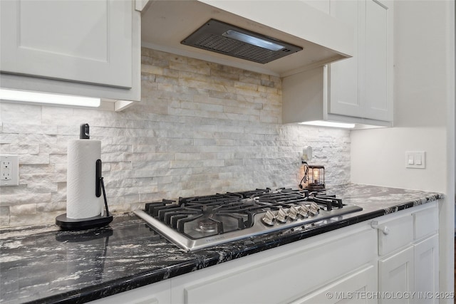 8721 E Joliet St, Broken Arrow, OK 74014 - kitchen featuring stainless steel gas stovetop, ventilation hood, white cabinets, and backsplash
