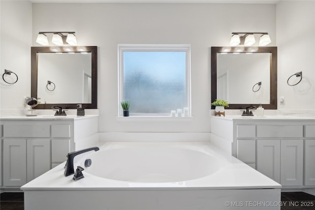 8721 E Joliet St, Broken Arrow, OK 74014 - full bathroom with a garden tub and two vanities