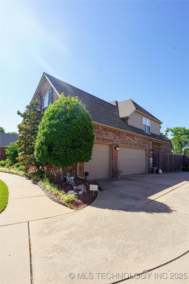 7808 E Broadway St, Broken Arrow, OK 74014 - view of home's exterior with brick siding, driveway, a garage, and a shingled roof