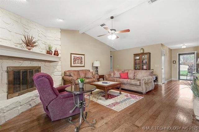 20941 E 102nd St S, Broken Arrow, OK 74014 - living room featuring wood finished floors, ceiling fan, and a stone fireplace
