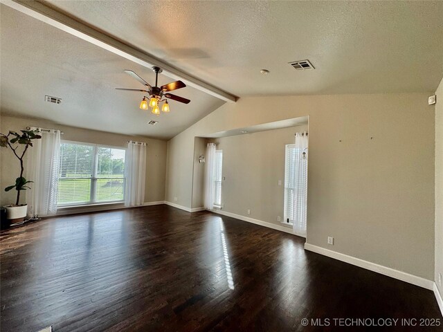 74232 S 320th Rd, Wagoner, OK 74467 - spare room with a textured ceiling, dark wood-type flooring, ceiling fan, and baseboards